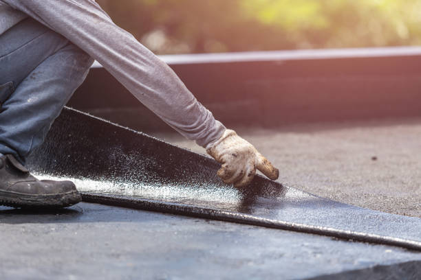 Professional Waterproofing technician working in Minetto, NY